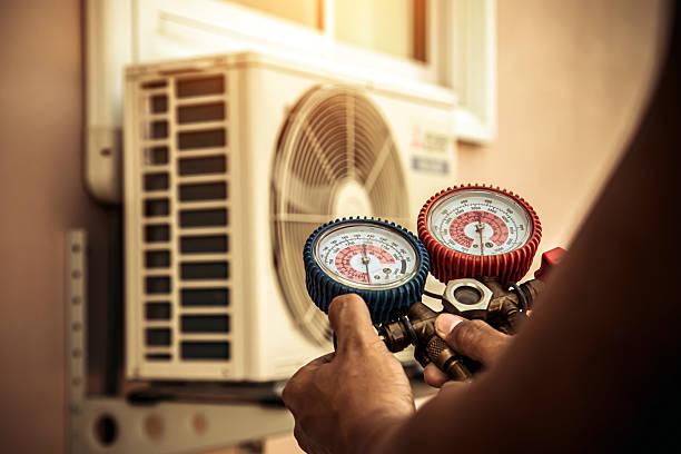 Professional Heat Pump Repair technician working in Mapleton, IA